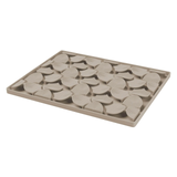 Beige silicone mold with wave pattern on a white background