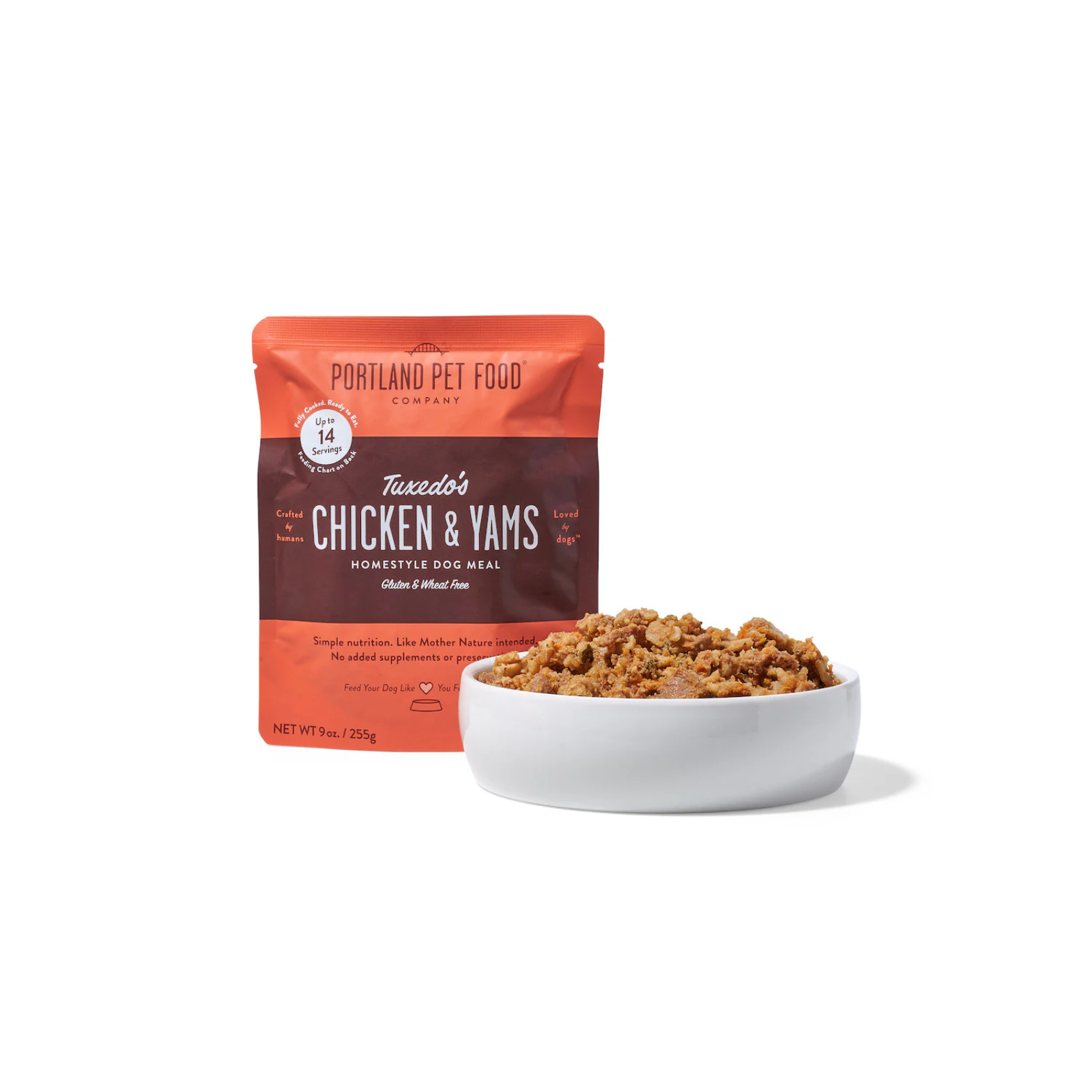 Portland Pet Food Company Tuxedo's Chicken & Yams dog food package with a bowl of food on a white background