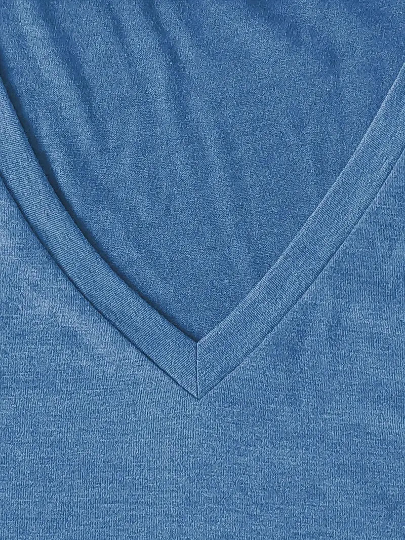 Close-up of a blue fabric with a V-neck design