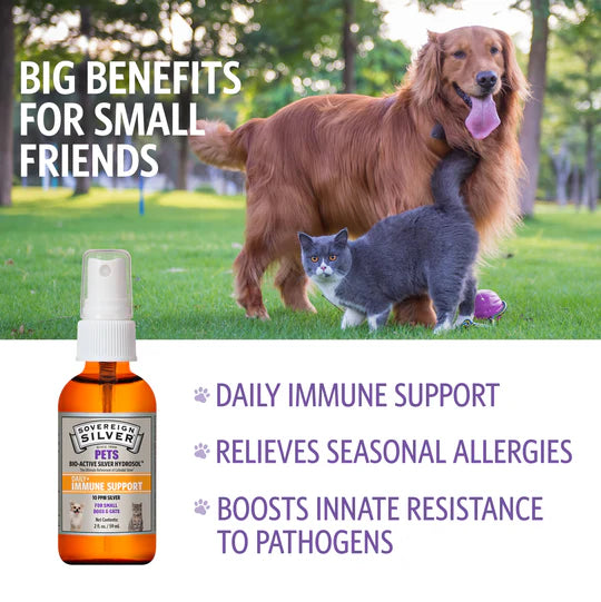 Dog and cat with a bottle of Sovereign Silver Pet product on a grassy field background.