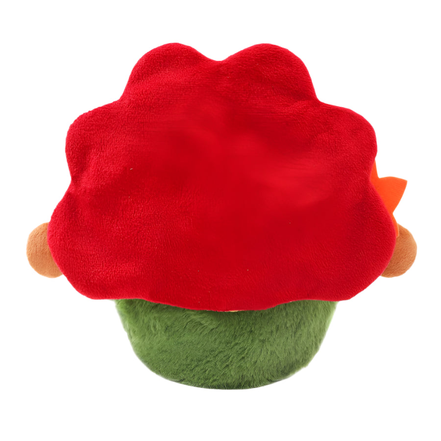 Plush toy with a red shell and green body on a white background