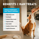 Cat being fed raw treats with a list of benefits on a blue and white background.