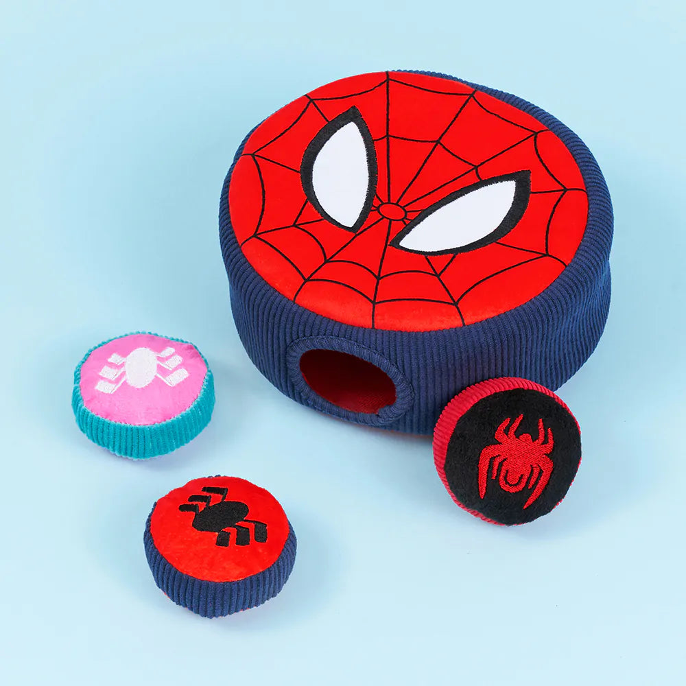 Spider-Man themed pet toy with multiple pieces on a light blue background