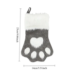 Gray and white paw print stocking with measurements on a white background