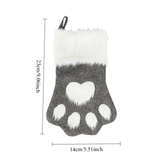 Gray and white paw print stocking with measurements on a white background
