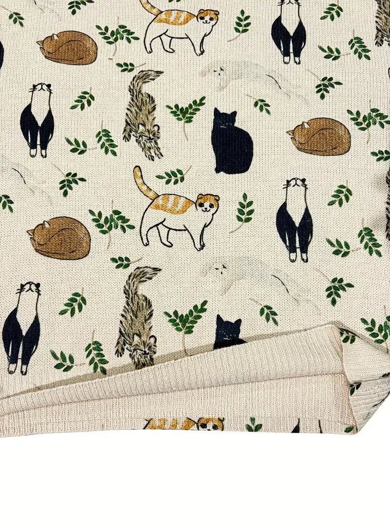 Patterned fabric with cartoon animals and leaves on a beige background