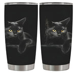 Two black tumblers with a black cat design on a white background