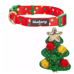 Red polka dot dog collar with green accents and a Christmas tree-shaped toy on a white background.