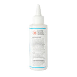 Bottle of Skout's Paw Muzzle with label on a white background