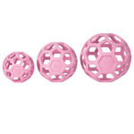 Three pink textured balls of different sizes on a white background