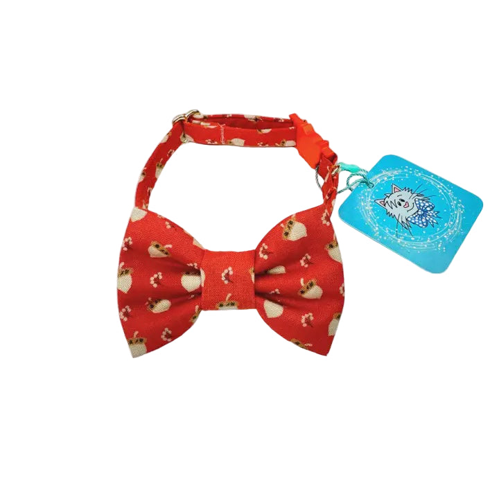 Red dog collar with bow tie and tag on a white background