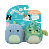Two Squishmallows plush toys in packaging with a blue and green design.