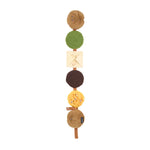 Decorative item with round, color-blocked elements on a white background
