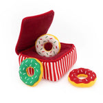 Red striped box with a donut-shaped toy inside, on a white background
