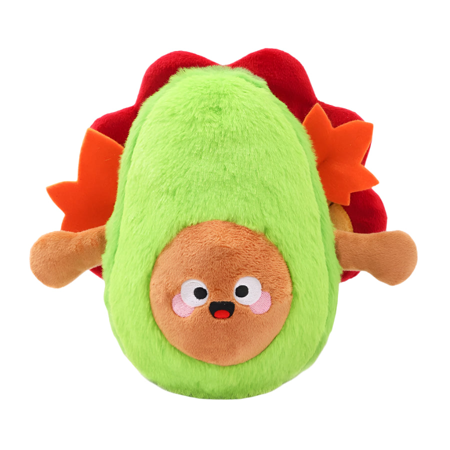 Plush toy shaped like an avocado with a face on a white background